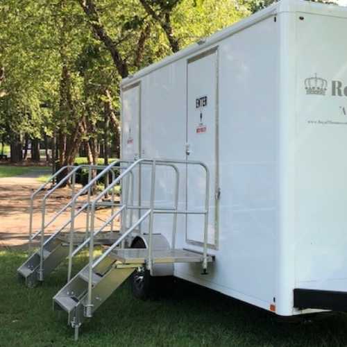 Luxury portable restroom trailer at outdoor event